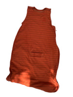 Load image into Gallery viewer, An orange-brown sleeveless top with thin vertical black pinstripes, laid flat on a white surface with dappled sunlight and shadows.
