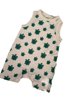Load image into Gallery viewer, A sleeveless baby top or bodysuit in cream with an all-over print of green sea turtles, laid flat on a white background.
