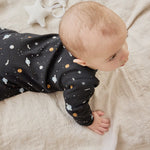 Load image into Gallery viewer, Galaxy Print on Black Footed Sleeper
